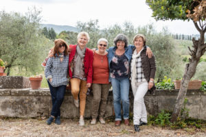 Portrait of senior women, olive trees in background, Florence, Italy Portrait of senior women, olive trees in background, Florence, Italy